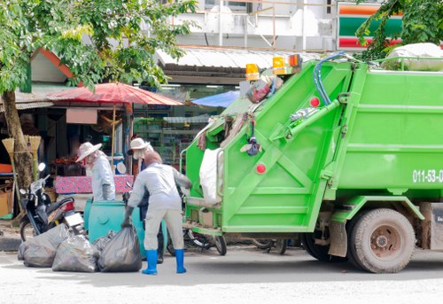 Waste clearance truck operating in South London